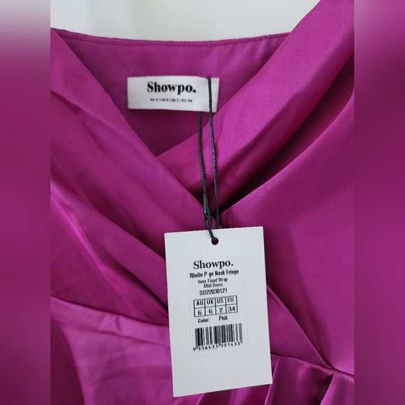 RHOLIE PLUNGE NECK FRINGE HEM FIXED WRAP MIDI DRESS IN PINK - Picture 6 of 11